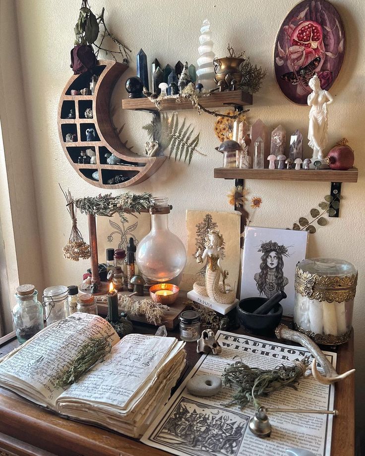 a table with many items on it and some candles in the corner next to them