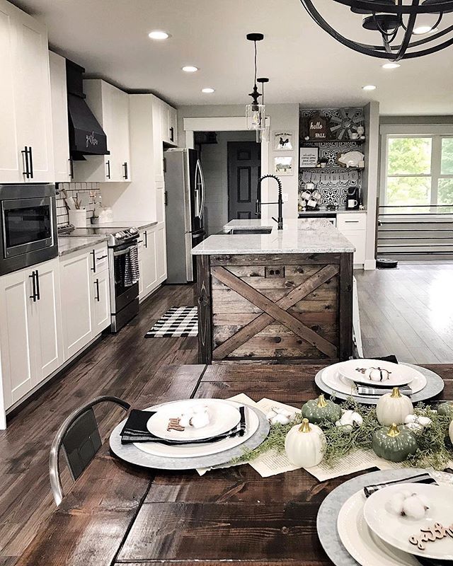 the kitchen is clean and ready to be used for dinner or other special occasion in someone's home