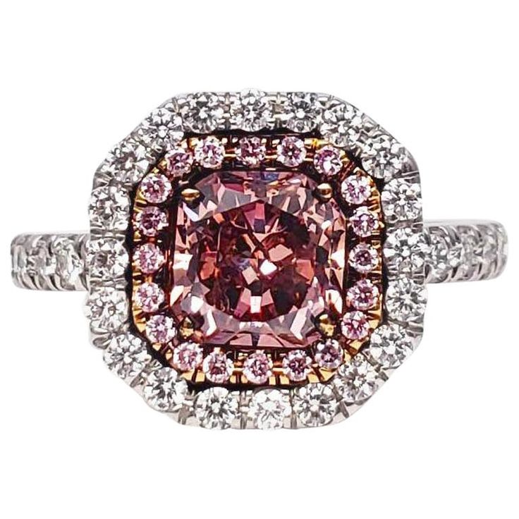 From SCARSELLI this Natural Fancy Deep Pink Radiant diamond of 1.00 carat, mounted in an 18k yellow gold with a halo of fancy pink round diamonds. The center diamond is accompanied by a GIA grading report (see certificate picture for more detailed stone's information) This diamond is available with this mounting. The price is negotiable. Should a client wish to customize settings to personalize the look, such as changing side stones or bands, we are happy to accommodate such requests. For this a Brilliant Cut Diamond Ring, Edwardian Engagement Ring, Contemporary Engagement Rings, Platinum Diamond Engagement Rings, Pink Round, Radiant Diamond, Expensive Jewelry, Deco Engagement Ring, Cushion Cut Diamonds