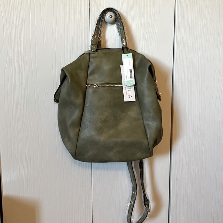 Vegan Sage Green Convertible Backpack Trendy Shoulder Bag Backpack With Detachable Handle, Trendy Backpack With Detachable Handle, Green Backpack Shoulder Bag For Errands, Green Backpack For Errands, Trendy Green Tote Backpack, Trendy Green Backpack For Everyday Use, Green Rectangular Bag With Adjustable Straps, Green Satchel Backpack With Zipper Closure, Green Everyday Backpack With Adjustable Straps