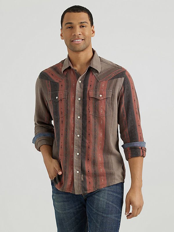 SERIOUS ON STYLE AND COMFORT Look good while feeling good in the men's Wrangler Retro® long-sleeve western snap printed shirt. This contemporary take on the classic style you love comes packed with all the distinctive details, including pointed front and back yokes, single-needle stitching at the placket, modern fit, contrast trim, two snap cuffs, and two chest flap pockets with snaps. This long-sleeve snap shirt features a modern fit and it's crafted from cotton for comfort, minimal wrinkling, Western Boots For Men, Retro Jeans, Wrangler Shirts, Work Boots Men, Jumpsuit Jacket, Retro Stripes, Feeling Good, Men's Shirts, Western Shirts