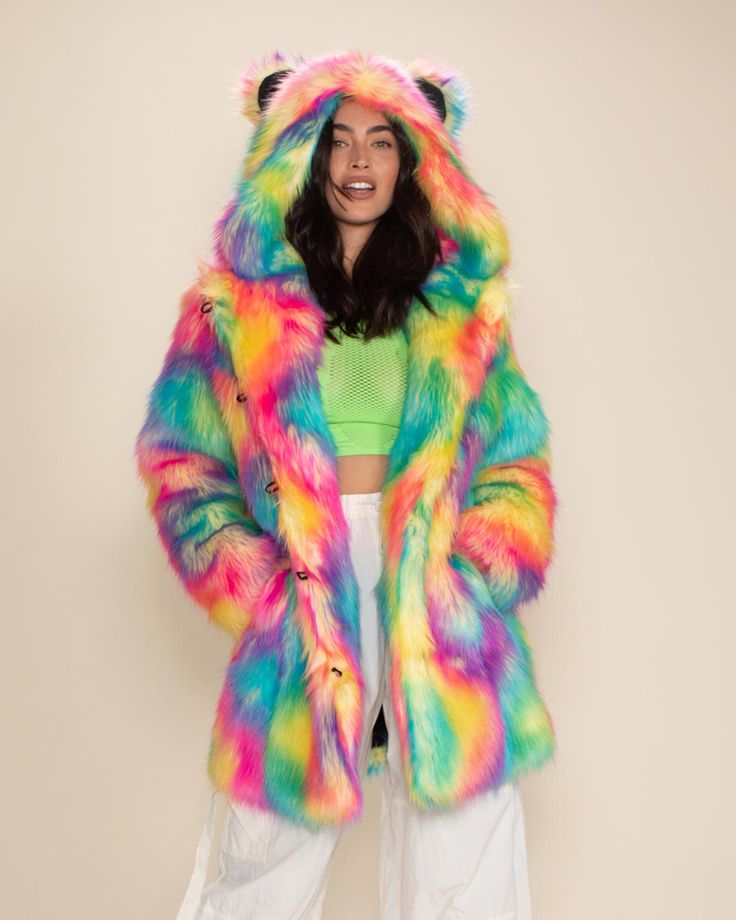 Women's Faux Fur Coat - Classic Our Colorful Faux Fur Coat for Women in Rainbow Bear, our best-selling women's festival coat, glows under UV Blacklight. Featuring custom bear buttons, an oversized hood with ears, and a secret zipper stash pocket. Catch everyone's attention when you wear this colorful faux fur to your next music festival or out prowlin' with friends. Rainbow Bear Characteristics PLAYFUL • POSITIVE • SOCIALDo you have the Spirit of the Rainbow Bear? If you do, you’re known for you