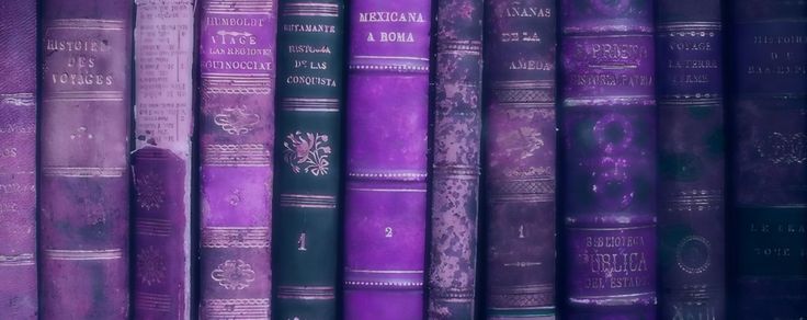 many purple books are lined up in rows