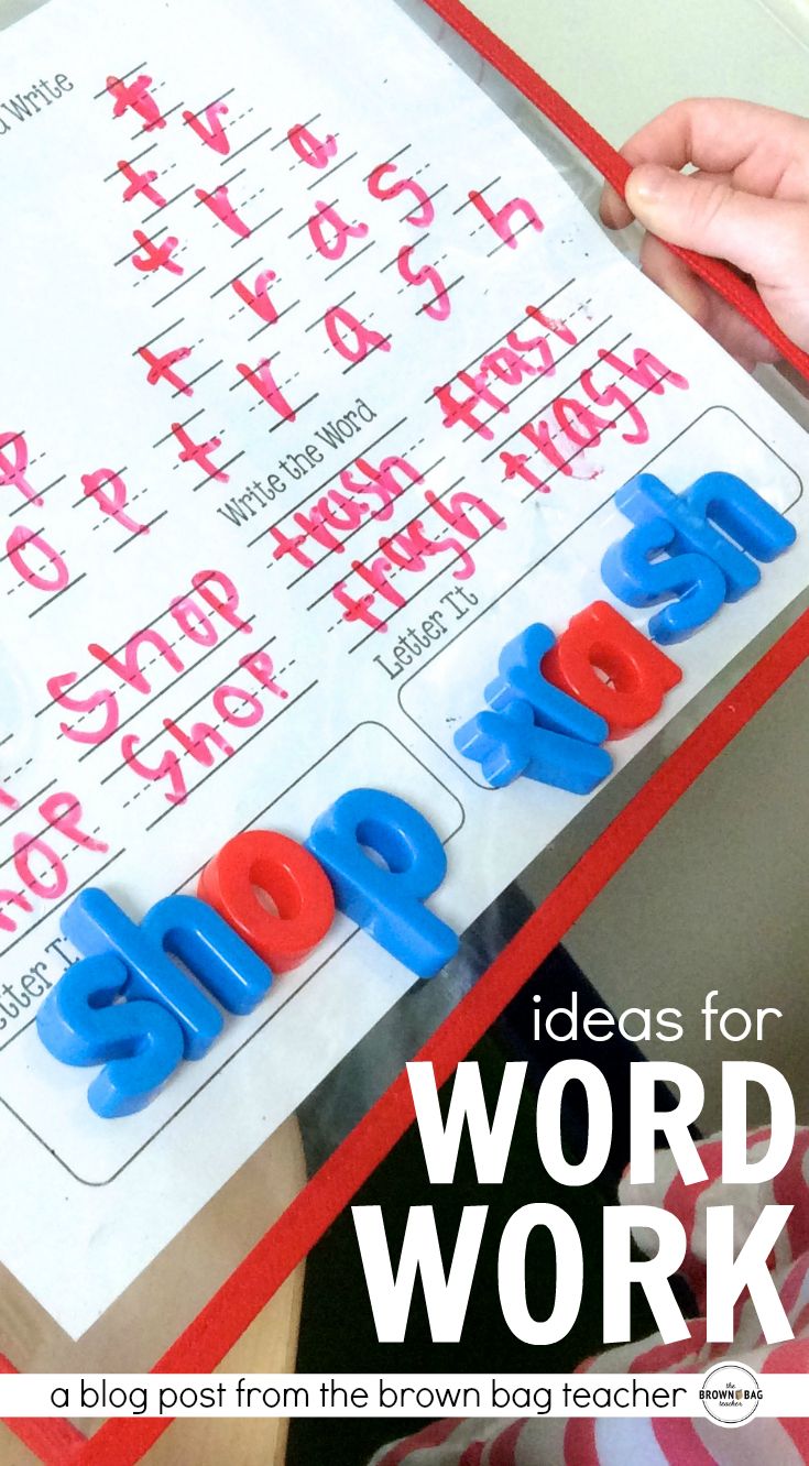 the word work is made out of plastic letters and placed on top of a piece of paper