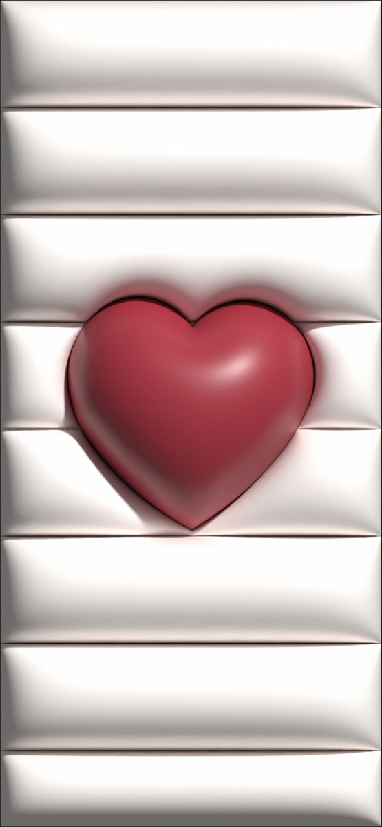 a red heart sitting on top of a window sill in front of white blinds