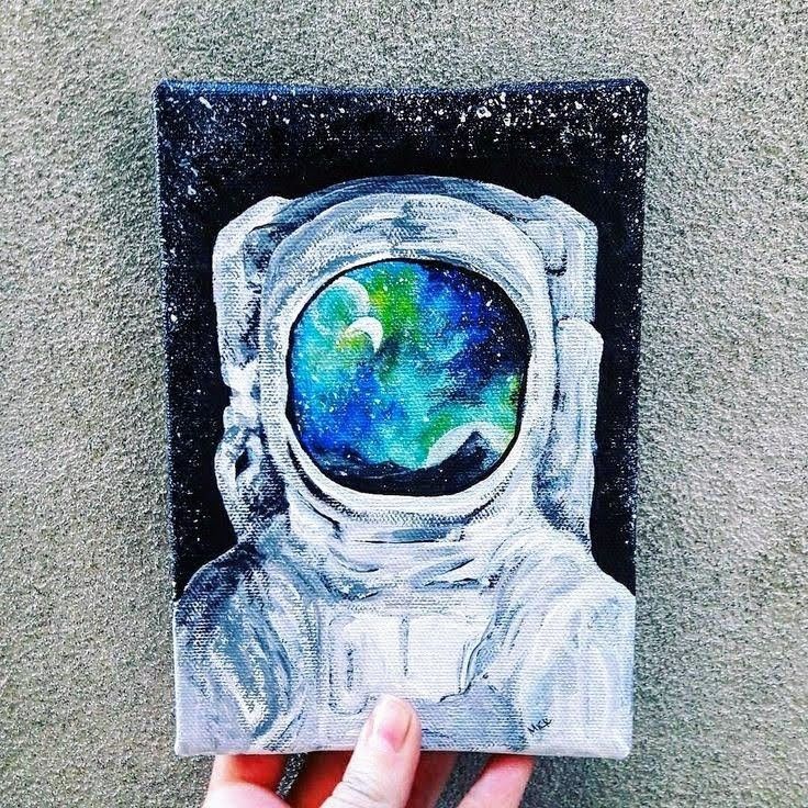 a painting of an astronaut's helmet with the earth in the center and stars above it