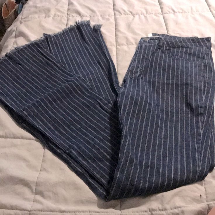 Blue Denim & White Pinstripe Bell Bottoms Size Medium Nwt Blue Vertical Stripes Pants For Spring, Blue Striped Pants For Spring, Spring Blue Bottoms With Striped Hem, Blue Bottoms With Striped Hem For Spring, Blue Wide Leg Pants With Vertical Stripes, Casual Blue Bottoms With Striped Hem, Trendy Blue Bottoms With Vertical Stripes, Spring Cotton Bottoms With Striped Hem, Pinstripe Wide Leg Cotton Bottoms