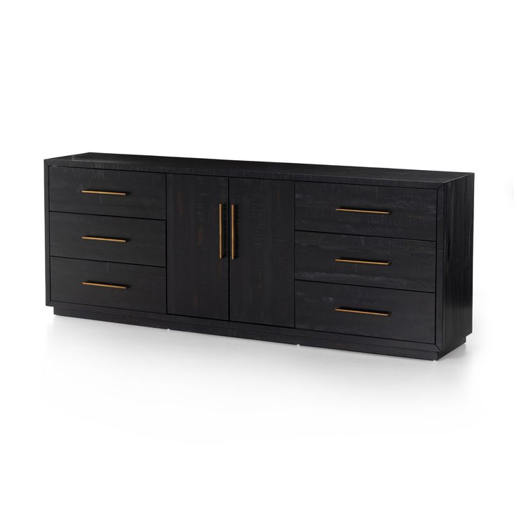 a black cabinet with gold handles and drawers on the front, against a white background