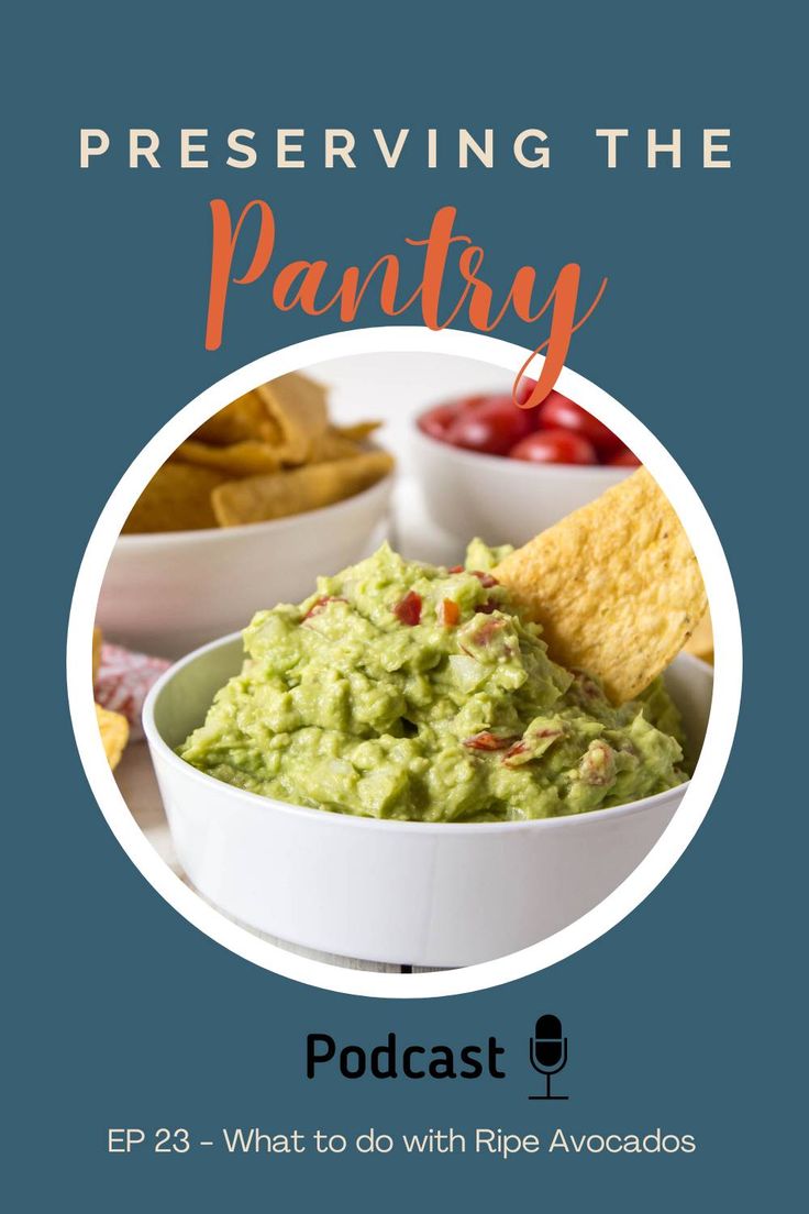 a bowl filled with guacamole and chips on top of a blue background