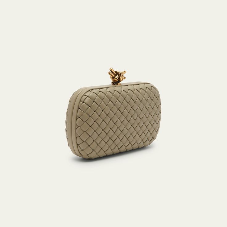 Bottega Veneta clutch bag in padded woven lambskin leather  Framed top with knot lift-clasp closure  Approx. 4.5"H x 7.5"W x 2"D Made in Italy Bottega Veneta Clutch, Bottega Veneta Bags, Leather Frames, Lambskin Leather, Bottega Veneta, Clutch Bag, Tops Designs, Brass, Luxury Fashion