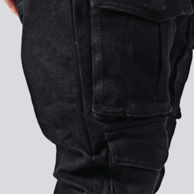 Introducing our mid-waist men's jeans from the 2023 Autumn Collection a perfect blend of couture and function!Why It's A Must-HaveDesigned to be a wardrobe staple. these jeans feature a conventional boot-flare silhouette that will never go out of vibe. With its mid-rise design. cargo pockets. and retro zipper and button closure. it's a perfect combination of fashion and function.Distinctive Features: Fashion-Forward: With a everlasting flare-leg silhouette and mid-waistline design. these jeans a Winter Streetwear Jeans With Multiple Pockets, Fall Mid-rise Jeans With Multiple Pockets, Urban Style Jeans With Multiple Pockets For Fall, Fitted Cargo Jeans With Patch Pockets For Streetwear, Urban Jeans With Multiple Pockets For Fall, Washed Black Straight Leg Jeans With Multiple Pockets, Winter Streetwear Jeans With Cargo Pockets, Winter Streetwear Jeans With Side Pockets, Washed Black Jeans With Side Pockets For Streetwear