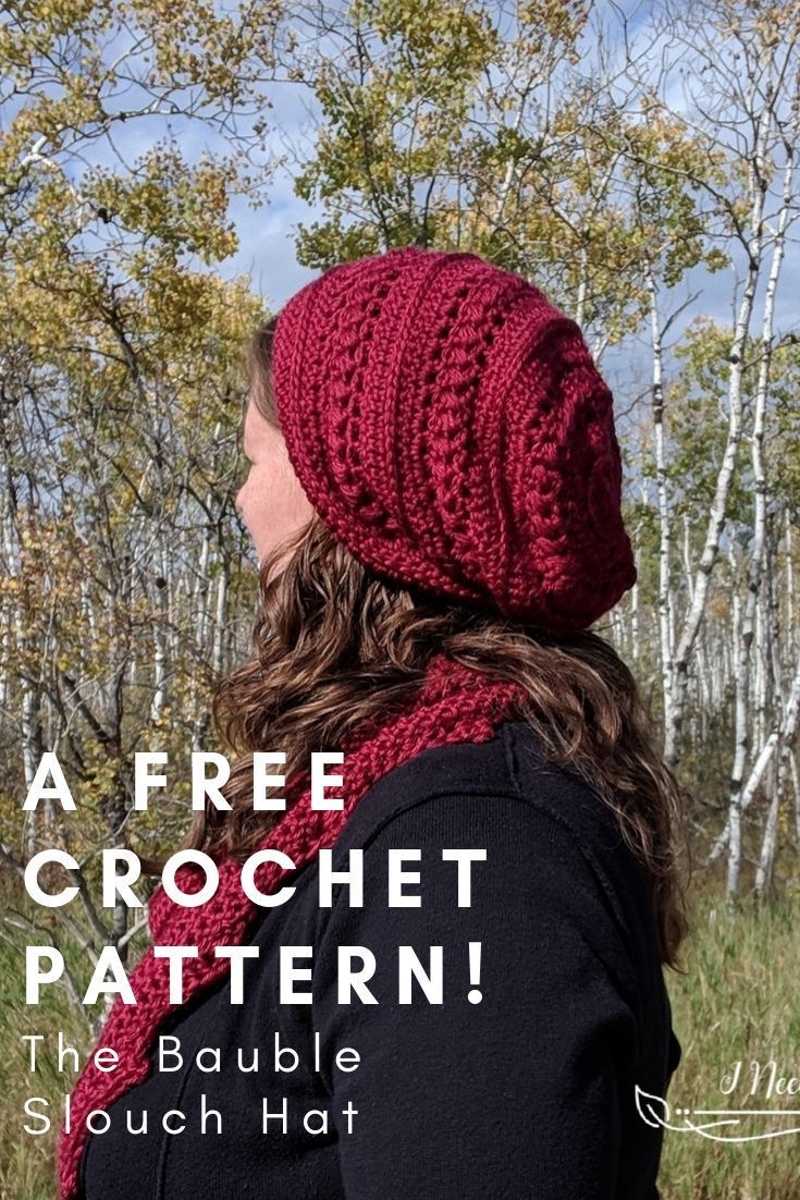 a woman wearing a red knitted hat with text overlay that reads, a free crochet pattern the bauble slouch hat