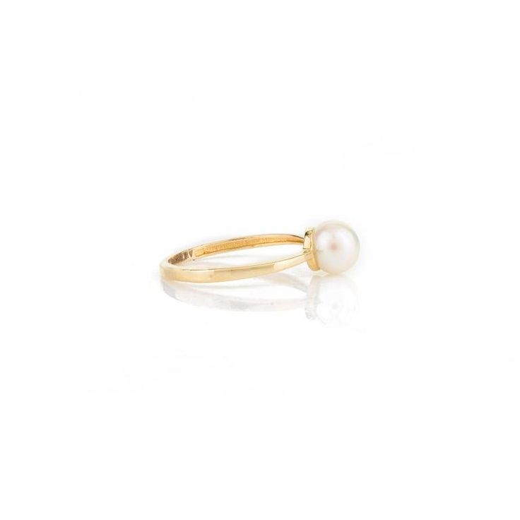 This is part of Chairish’s Fine Jewelry assortment.  Elegant Natural Pearl Solitaire Ring in 18K Gold featuring natural pearl of 1.7 carats. The gorgeous handcrafted ring goes with every style. Pearl symbolizes purity, determination and perfection.  Designed with a round cut pearl set in center of the ring that makes it a perfect fit to wear it on your occasion or style it with any of your basic outfit to give it a glam. This is a perfect Solitaire Pearl Ring. It can be a Bridal Shower Gift, Rin Single Stone Ring, Mother Daughter Gifts, Single Stone, Pearl Set, Bff Gifts, Handcrafted Rings, Daughter Gifts, Pearl Ring, Natural Pearls