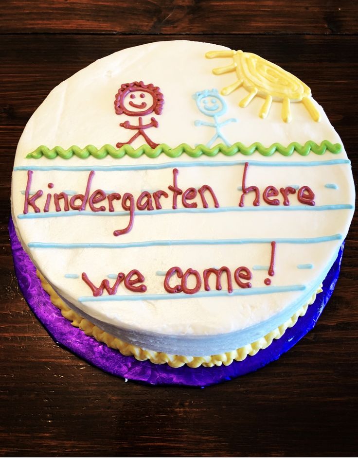 a cake that has been decorated with the words, children here we come on it