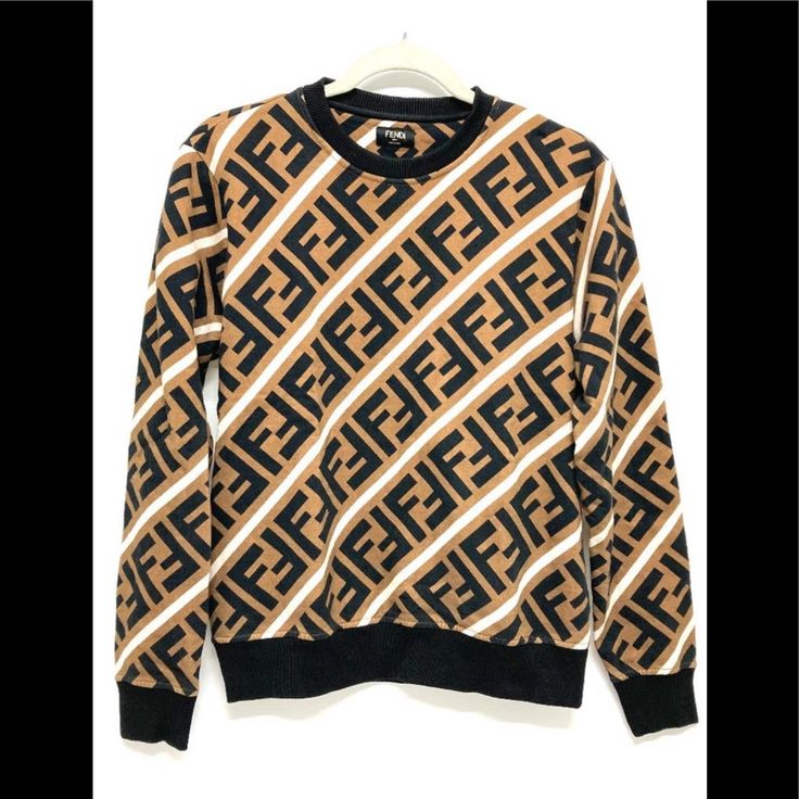 100% Authentic Fendi Sweatshirt. Size Medium. Thick Quality. This Has Been Worn A Few Times, But Is In Excellent Condition. I Ended Up Purchasing A Larger Size. No Rips Or Stains. Smoke Free Home. Feel Free To Ask Questions. Designer Logo Print Sweatshirt For Fall, Designer Logo Print Sweater For Fall, Designer Fall Sweater With Logo Print, Luxury Brown Long Sleeve Tops, Luxury Long Sleeve Sweater With Logo Print, Luxury Logo Print Sweater For Fall, Designer Crew Neck Tops For Fall, Luxury Crew Neck Top For Fall, Designer Brown Long Sleeve Tops