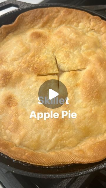 an apple pie in a skillet on top of a stove with the words skillet