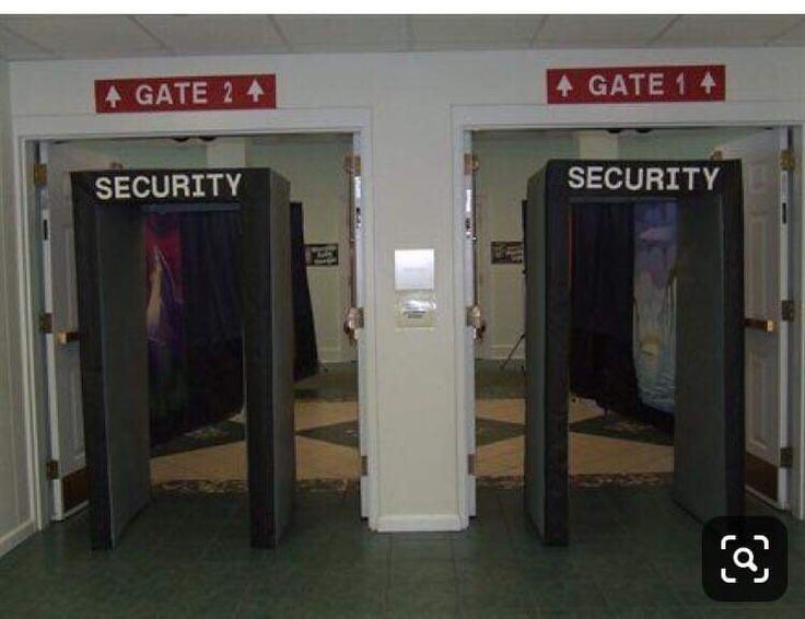 two open doors with security signs on them