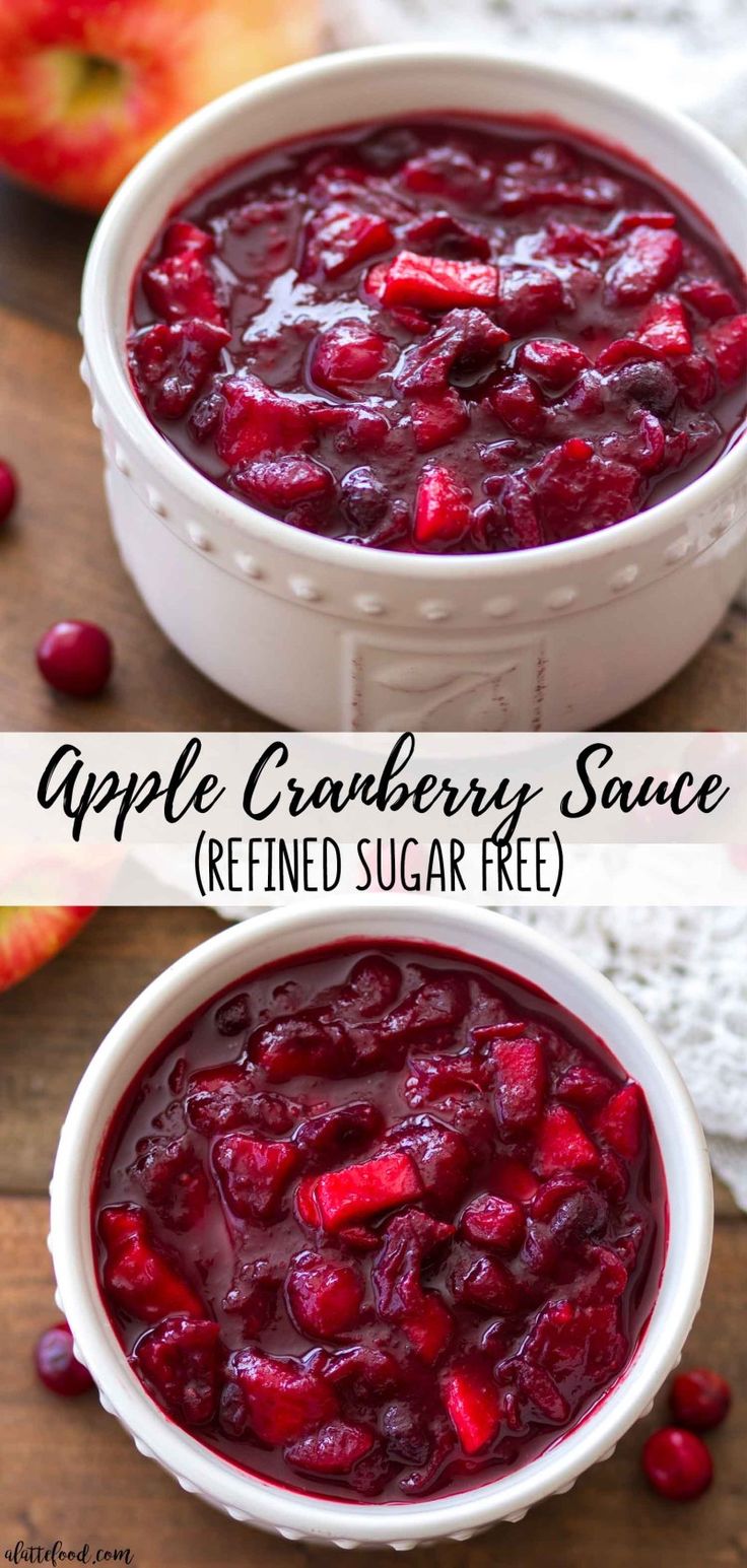 two bowls filled with cranberry sauce on top of a wooden table next to an apple