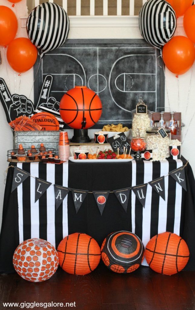 a basketball themed birthday party with orange and black decorations