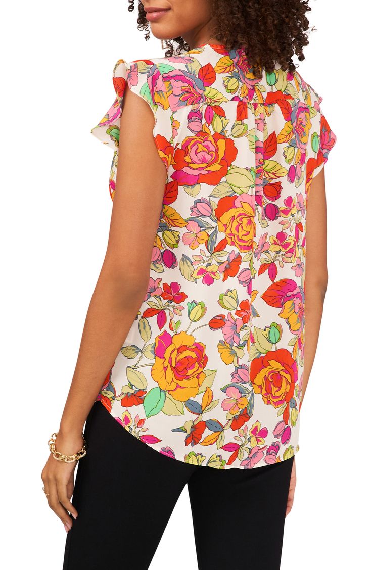 Fluttering sleeves frame this lively printed blouse topped with a dipped neckline and punctuated with a curved hem. 27" length V-neck Short sleeves 100% polyester Machine wash, tumble dry Imported Business Casual Blouse, Purple Leopard Print, Flutter Sleeve Blouse, New York Black And White, Beaded Blouse, Blouse Nordstrom, Lace Tunic, Leopard Print Blouse, Black And White Blouse