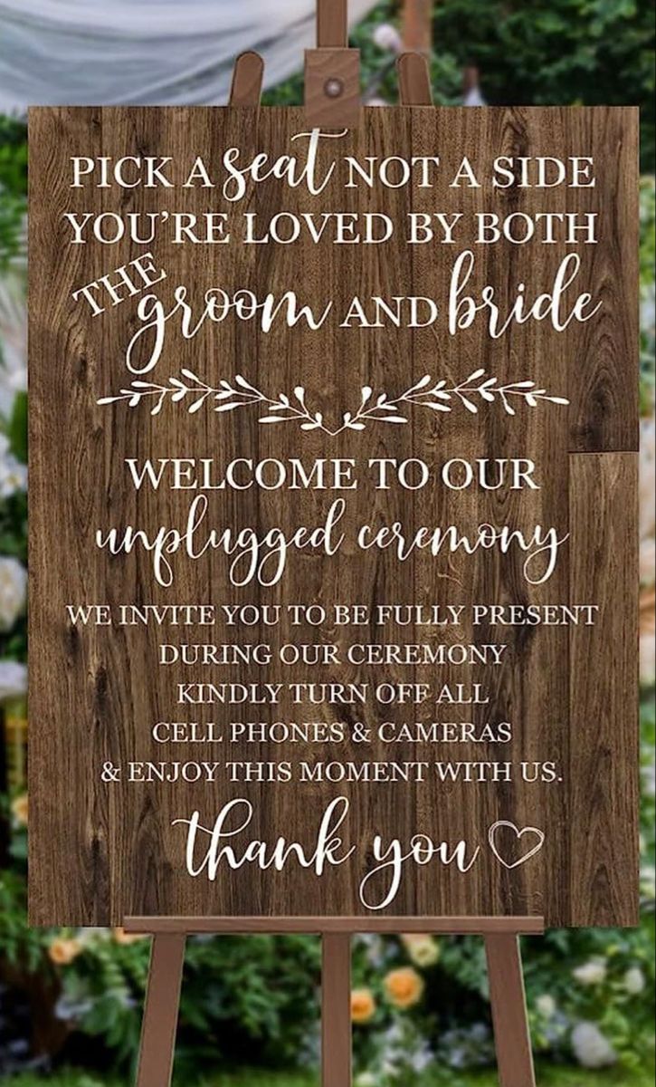 a wooden sign that says pick a seat not a side you're loved by both the groom and bride