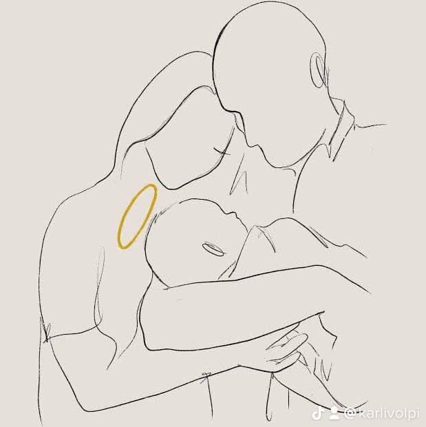 a drawing of a man holding a baby in his arms with a gold ring on it's forehead