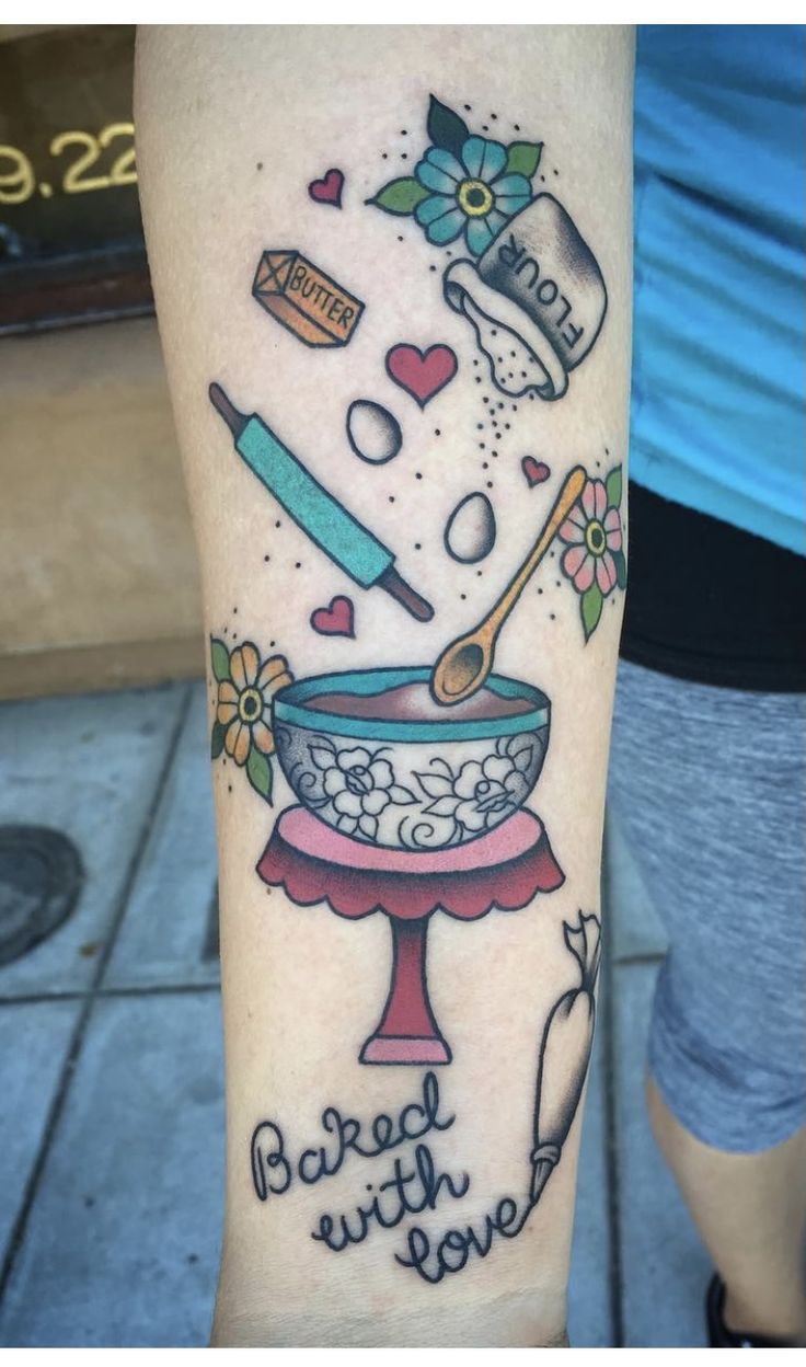 a person with a tattoo on their arm that says, i love baking and cake