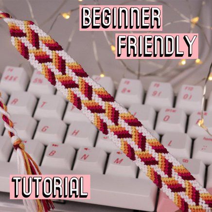 a close up of a computer keyboard with a string attached to the key and text reading beginner friendly