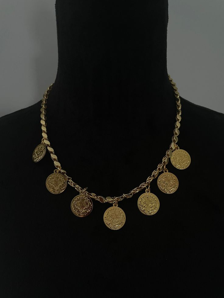 Simple xordol chain with  7 dime size liras attached Jewelry for women gifts Middle Eastern style accessories for weddings Kurdish clothes and necklaces earrings belts lira coin jewelry Arabic Balkan Kurdish jewelry for special occasions and every day wear You may also like this: https://www.etsy.com/listing/1497198187/stacked-lira-ringlira-co-jewelry?click_key=eefabd823aeb36fbc232af9deb1ee91f01a8d0d5%3A1497198187&click_sum=271029ef&ref=shop_home_active_23&frs=1 Kurdish Jewelry Jewelry for women Middle Eastern Necklace, Gold Bohemian Coin Pendant Necklace, Elegant Coin-shaped Chain Necklace With Adjustable Chain, Metal Medallion Chain Jewelry, Metal Medallion Jewelry With Chain, Elegant Coin Necklace With Chain, Metal Coin Necklace With Chain, Metal Coin Necklace With Clavicle Chain And Round Pendant, Elegant Coin Medallion Necklace With Chain