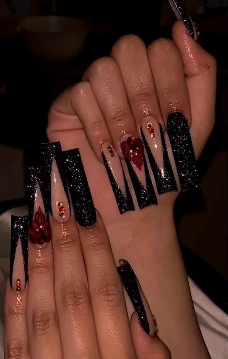 Red And Black Bling Acrylic Nails, Wedding Nails Red And Black, Prom Nails Acrylic Red And Black, Mascarade Nail Designs, Black And Red Nails With Rhinestones, Black Red Bottom Nails With Rhinestones, Nails Acrylic Black Design, Black And Red Nails For Prom, Dark Color Acrylic Nails