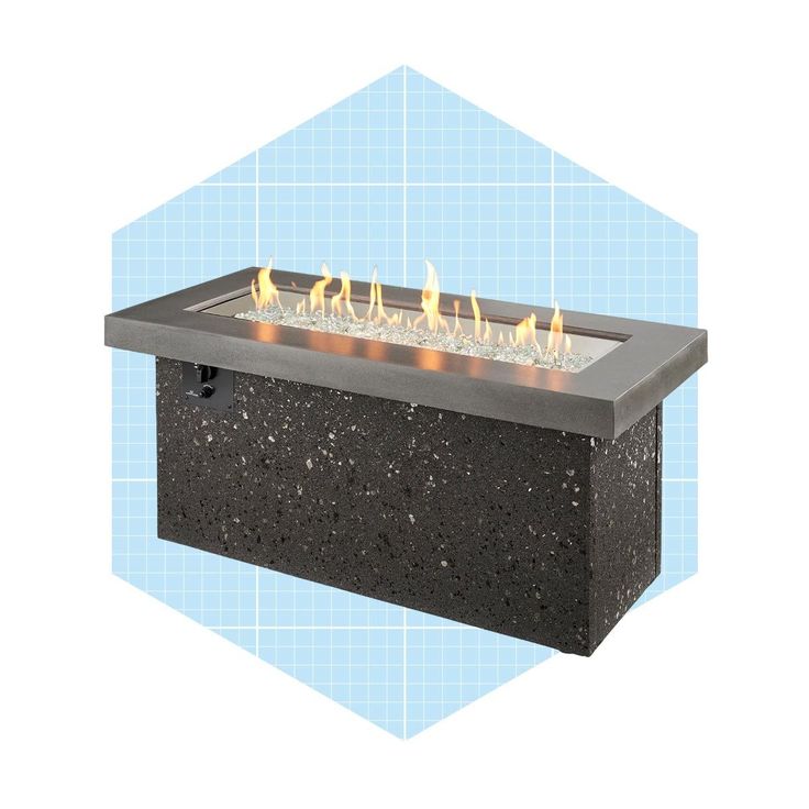 an outdoor fire pit is shown with flames on the top and bottom part, in front of a blue hexagonal background