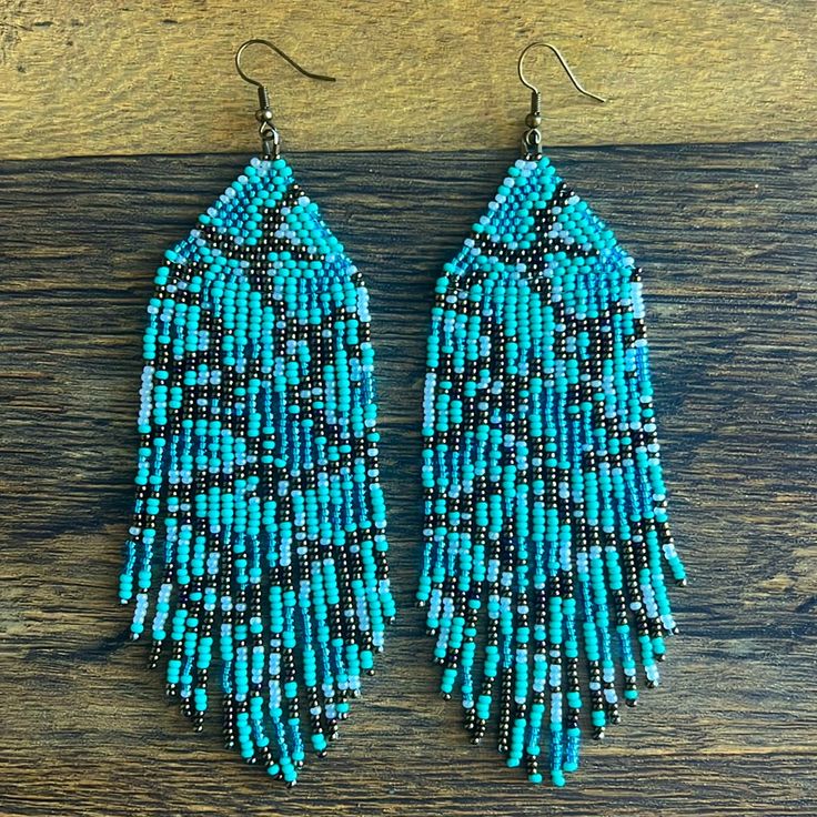 These Beautiful Handmade Beaded Earrings In Turquoise, Brown And White Colors. They Have A Granite Design. Measure From Top Of Hook To Bottom 5.5” And 1.75” Wide. These Are Great For Country Concerts, Festivals, Date Nights Or Just For Plain Fun. The Hook Is A Bronze Tone Color. Blue Round Beads With Beaded Fringe, Blue Bohemian Beaded Chain Earrings, Artisan Turquoise Beaded Fringe Earrings, Artisan Blue Earrings With Beaded Fringe, Artisan Blue Round Beaded Earrings, Artisan Blue Beaded Earrings With Colorful Beads, Granite Design, Jewellery Diy, Handmade Beaded Earrings