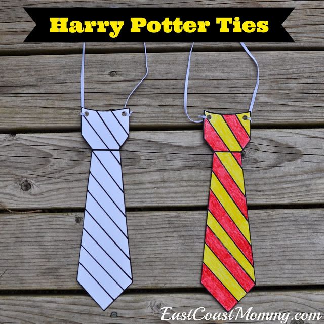 two paper ties are hanging on the side of a wooden fence with text overlay that says harry potter tie