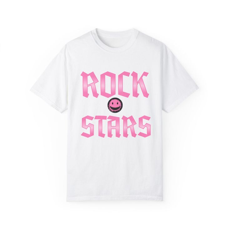 Rock your support for Doral's most talented young musicians with the "Doral Teen Rockstars Team Tee" from Jarastyle's Youth Collection. This T-shirt is a tribute to the passion, energy, and creativity of the teen rockstars who are making waves in the Doral music scene. Designed for fans, friends, and fellow musicians, it's a way to show your pride and encouragement for the local talent that brings rhythm and life to our community. Made from soft, comfortable fabric, the "Doral Teen Rockstars Tea Rock T-shirt For Fan Merchandise With Graphic Print, Rock And Roll Fan Merchandise Short Sleeve T-shirt, Cap Collection, Trendy Tote Bags, Making Waves, The Passion, Band Tees, Custom Creations, Apparel Design