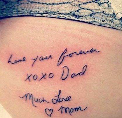 the back of a woman's stomach with writing on it that says, i love you