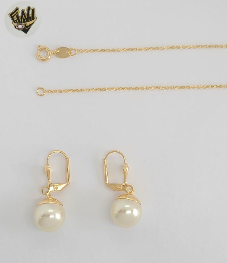 Description: -Earrings, Pendant and Necklace Pearls Set. ( not natural pearl) -Material: 18k Gold Filled (BGF). -Chain Width: 1mm. -Beads: 12mm. -Available in Size: 18". Elegant Gold Pearl Necklace With Matching Earrings, Dainty Gold Jewelry Sets For Formal Occasions, Formal Dainty Gold Jewelry Sets, Gold Jewelry Sets With Pearl Pendant For Formal Occasions, Formal Jewelry Sets With Round Pearl Pendant, Formal Round Jewelry Sets With Pearl Pendant, Elegant Round Pearl Chain Jewelry Sets, Formal Jewelry Sets With Pearl Pendant, Elegant Pearl Chain Jewelry Sets