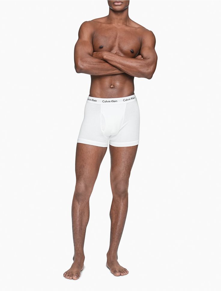 A Calvin Klein icon. The essential designer trunk reinvented in extra-soft cotton stretch. Made with wicking to keep you cool and dry. Designed with the original Calvin Klein logo waistband, this is a sporty look that feels sexy everyday. With a functional fly, supportive pouch and more coverage than our hip brief, this style is easy under anything.  Material: 95% Cotton, 5% Elastane. Ideal Male Body, Boxers Briefs, Best Black Friday, Woman Silhouette, Calvin Klein Men, Calvin Klein Black, Sporty Look, Male Body, Party Shirts