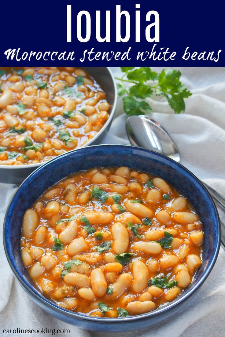 two bowls filled with white beans and garnished with parsley on the side