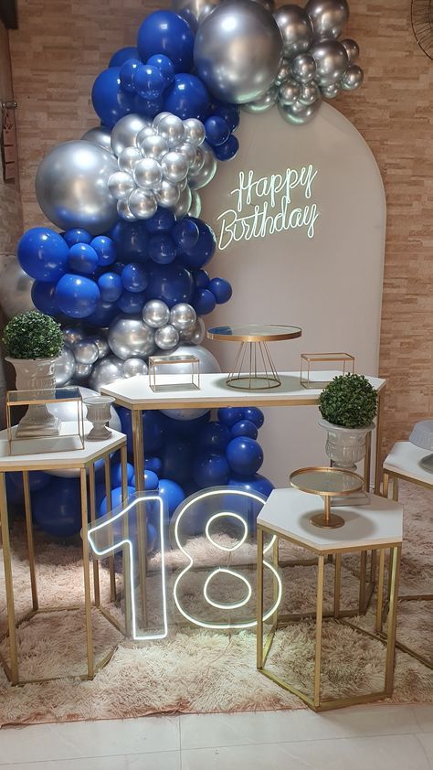 a birthday party with balloons and decorations