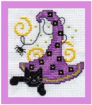 a cross stitch pattern with a black cat and a purple tower on it's side