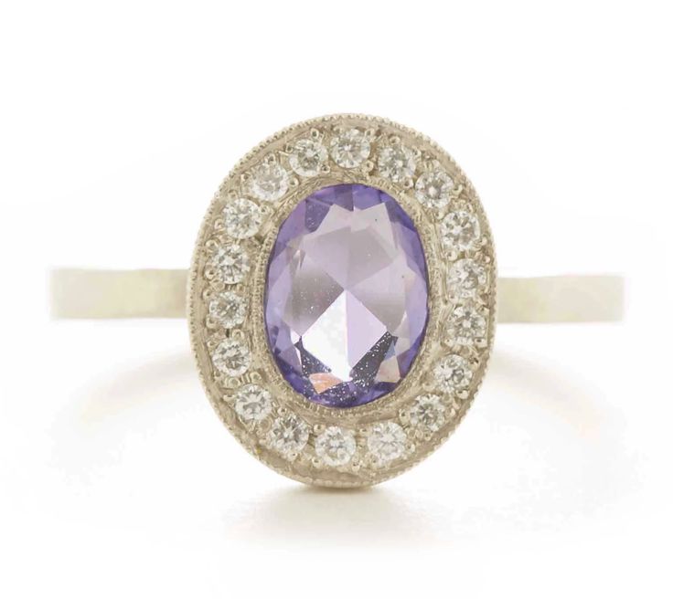 This 18k gold Lux plus ring features an 8x6mm purple sapphire accented with round full cut diamonds. Our Lux plus rings feature a more substantial band to accommodate deeper full cut gemstones. Stacks perfectly with the Hewn Hammered 2x2 Plain Band. Purple Sapphire Oval Ring, Oval Purple Sapphire Rings, Lavender Diamond Oval Ring, Lavender Oval Diamond Ring, Purple Oval Brilliant Cut Ring, Classic Sapphire Rings In Purple, Oval Purple Sapphire Ring With Diamond, Purple Oval Diamond Ring, Oval Purple Platinum Rings