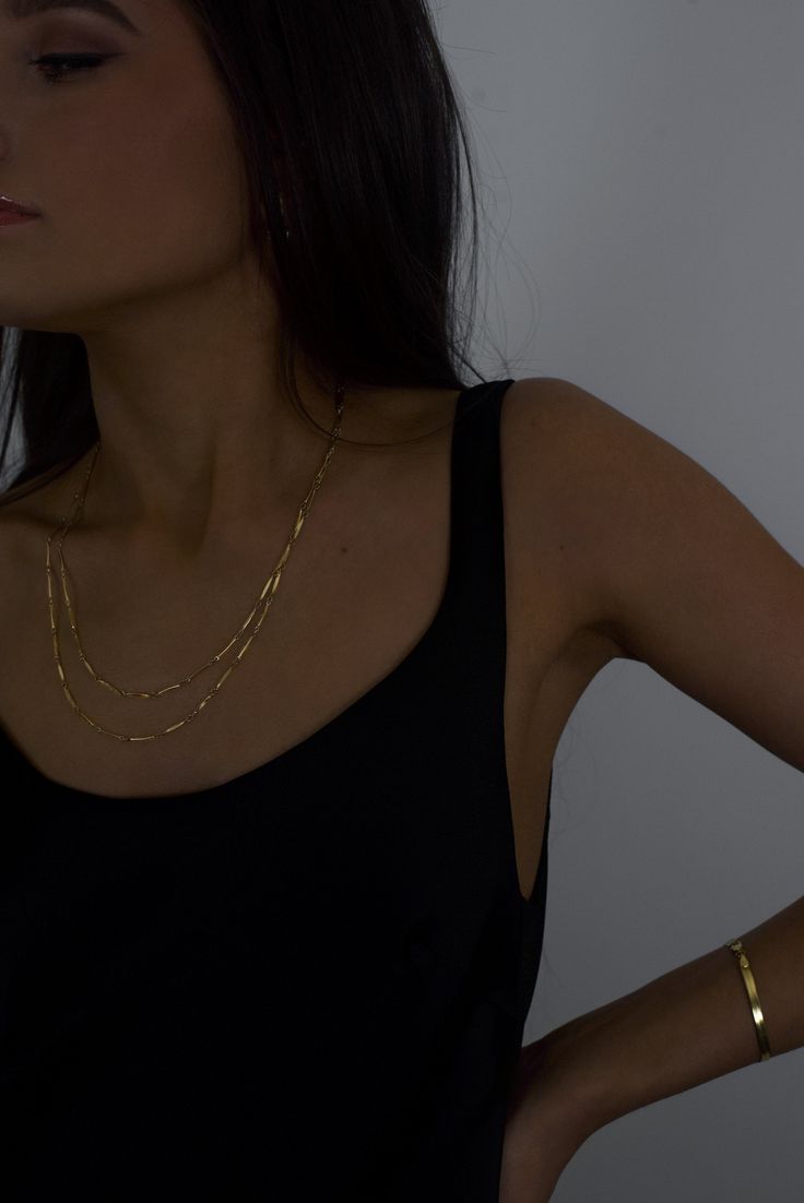 The Lex necklace, crafted with double draped 14K Gold-filled bar chain, is recognized for its brilliant layers and single clasp feature. The elongated flat bars reflect on the skin, creating a subtle yet lustrous glow. The luxurious detailing is enough to stand alone, or accompany any pieces from the Hydez Essential Collection.Material: 14K Gold-filledDimensions: 20 to 21 inches adjustable, 2mm chain width What is 14K Gold-filled? A thick gold layer (100 times more gold than gold plating) is bon Gold Plating, Gold Filled, Chain Necklace, Plating, Bar, Chain, Skin, Gold