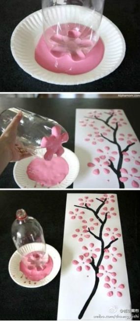 some paper plates with pink and black designs on them, one is made to look like a tree