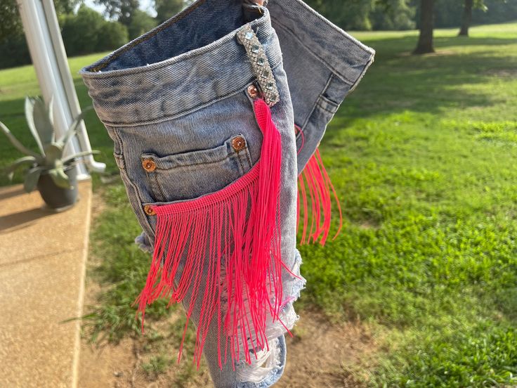 Neon pink fringe and rhinestone embellished shorts. Can make any size, color, or design. Message me for more info on getting your custom shorts! Spring Festival Shorts With Fringe, Pink Fringe Bottoms For Summer, Summer Pink Bottoms With Fringe, Summer Pink Fringe Bottoms, Pink Short Bottoms For Festival, Summer Festival Shorts With Fringe, Summer Festival Fringe Shorts, Festival Fringe Shorts, Red Tube Top