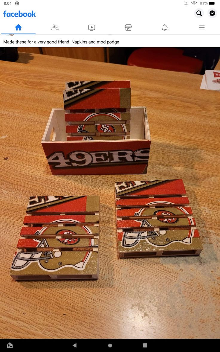 three boxes are sitting on a table with the numbers fortyers painted on them, and one box is empty