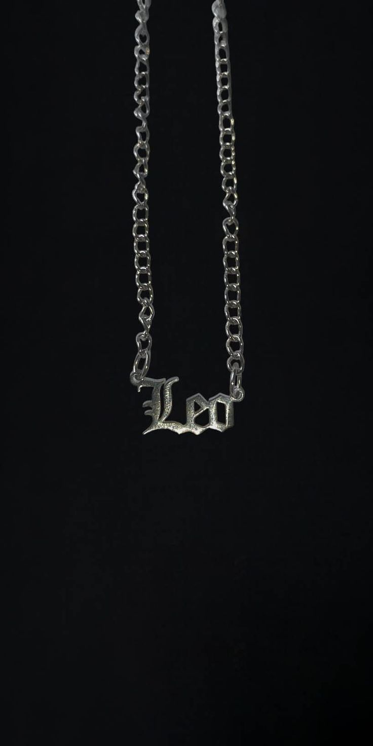 "Embrace the bold and confident essence of the Leo sign with our Stainless Steel Leo Necklace, a sleek and minimalist homage to the majestic lion of the zodiac. Crafted with meticulous attention to detail, this necklace features a stylish stainless steel pendant showcasing the symbol of Leo - the lion - in a clean and elegant design. Designed for those who appreciate modern aesthetics and meaningful symbolism, this necklace effortlessly enhances any ensemble with its refined aesthetic. Whether worn solo for a subtle nod to your zodiac sign or layered with other pieces for a personalized look, it exudes contemporary style and sophistication. The durable stainless steel construction ensures longevity, while its hypoallergenic properties make it suitable for everyday wear in our fast-paced wo Leo Necklace, Majestic Lion, Leo Sign, Refined Aesthetic, Inner Light, Stainless Steel Pendant, Modern Aesthetics, Gorgeous Necklaces, The Lion