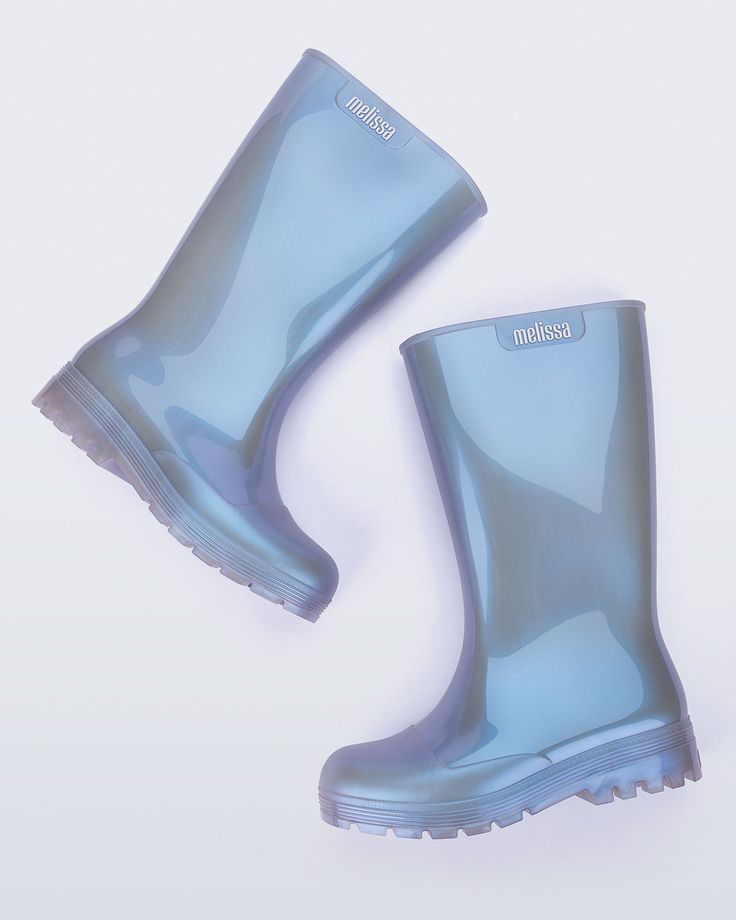 Meet the Melissa Welly, our take on galoshes. These bubble-gum-scented boots will help you get around in waterproof (and fashionable) style. Made of 100% Melflex, they’re recyclable and sustainable to boot. Sorry, we had to. Blue Waterproof Boots For Rainy Weather, Blue Weatherproof Boots For Rainy Weather, Weatherproof Blue Boots For Rainy Weather, Blue Round Toe Rain Boots, Trendy Weatherproof Rain Boots For Outdoor, Platform Shoes Boots, Fisherman Sandals, Sandal Platform, Tutti Frutti