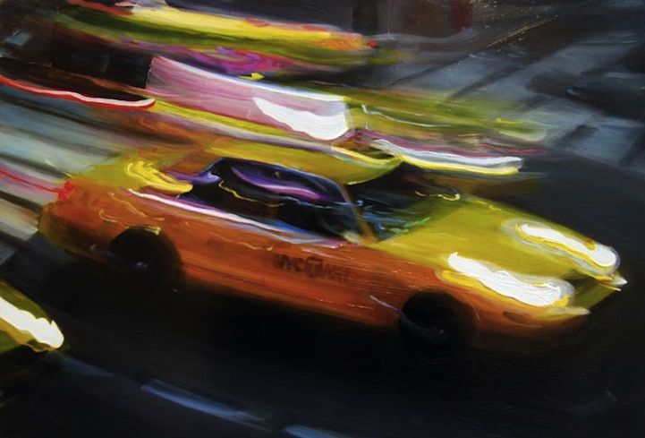 an orange car driving down the street with other cars behind it in blurry motion