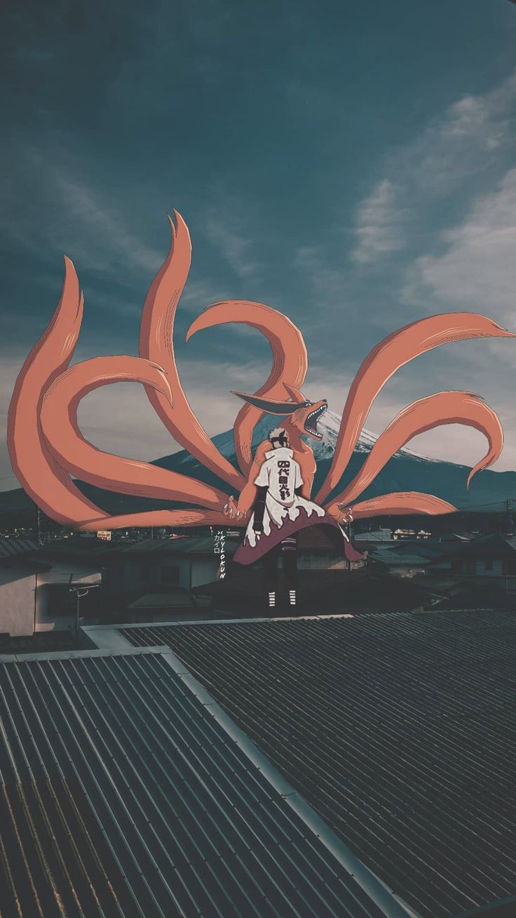 a woman standing on top of a roof next to a large orange dragon sculpture in the sky