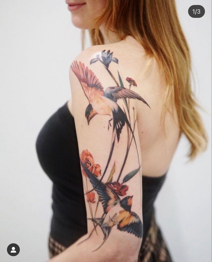 a woman with a tattoo on her arm